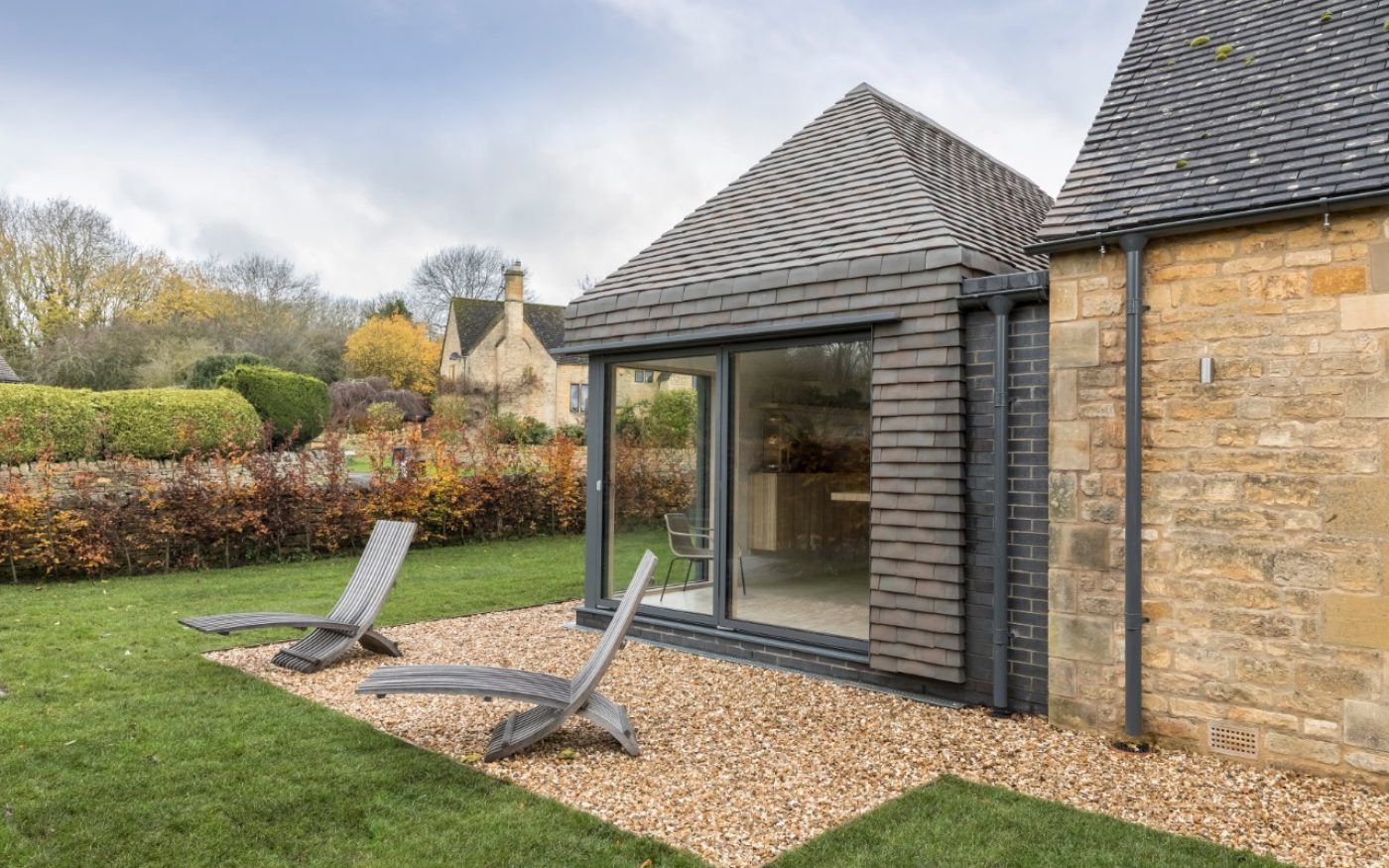 Aerial view of modern extension on 1950s Cotswolds house