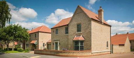 Warm modern housing estate with hints of historical character