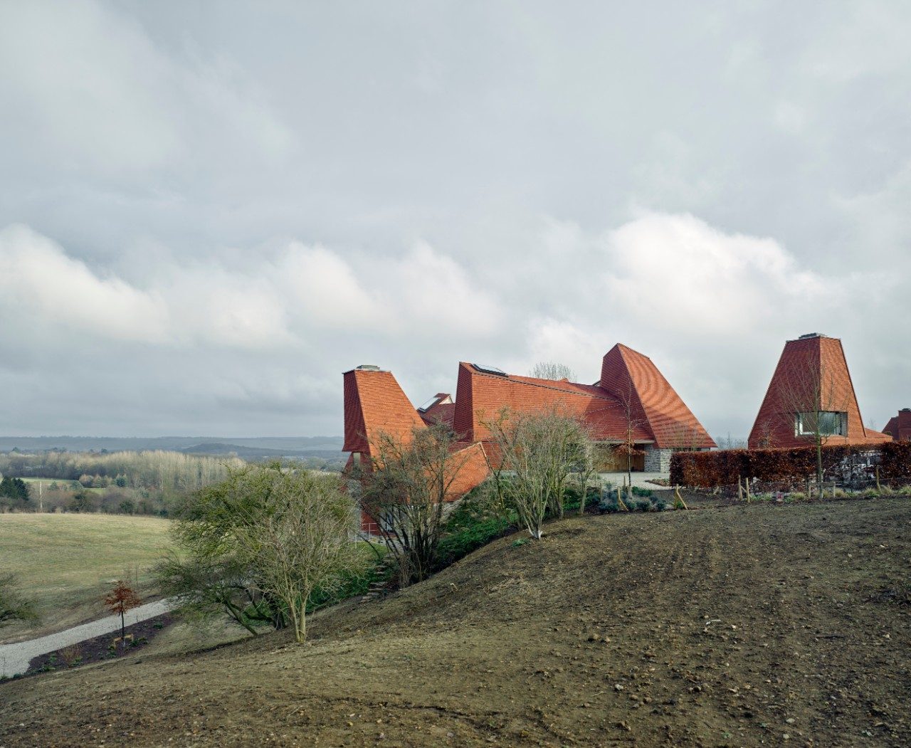 Caring Wood house against cloudy sky