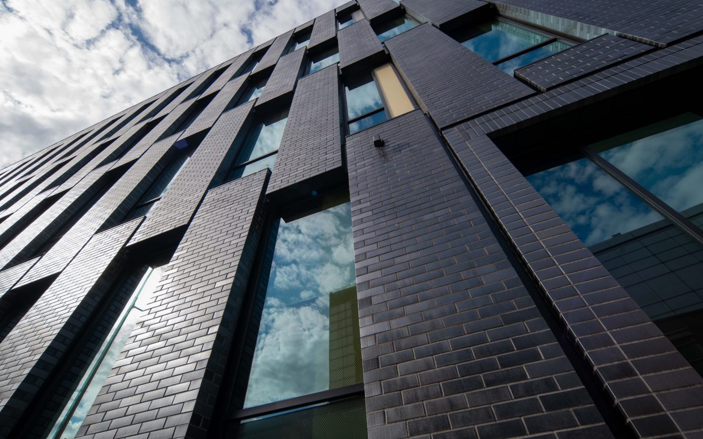 Dark coloured brick tile facade