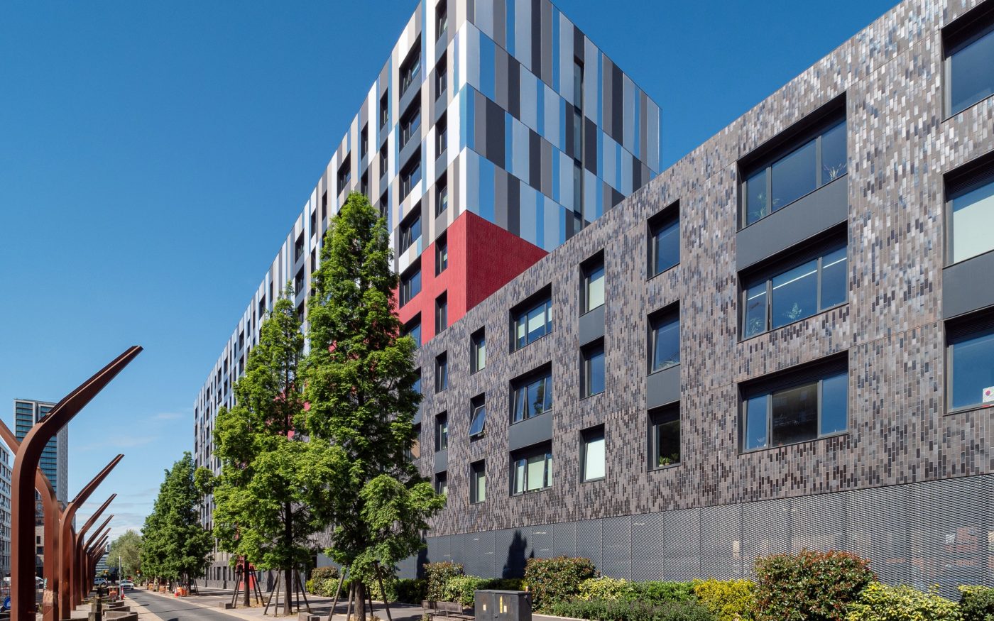 Brick tile cladding on outside of modern apartment building