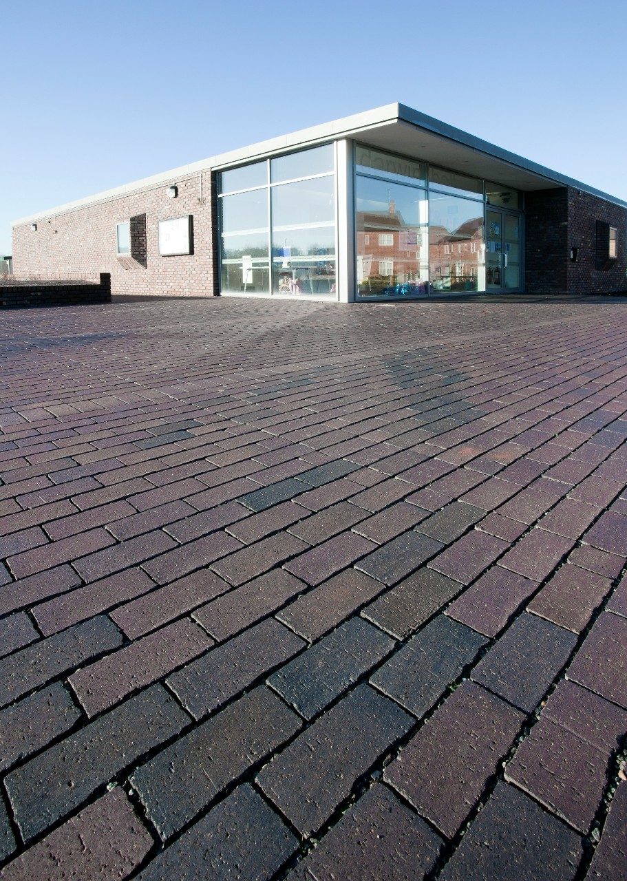 Community Centre built in Hectic Red brick with Aquata paver